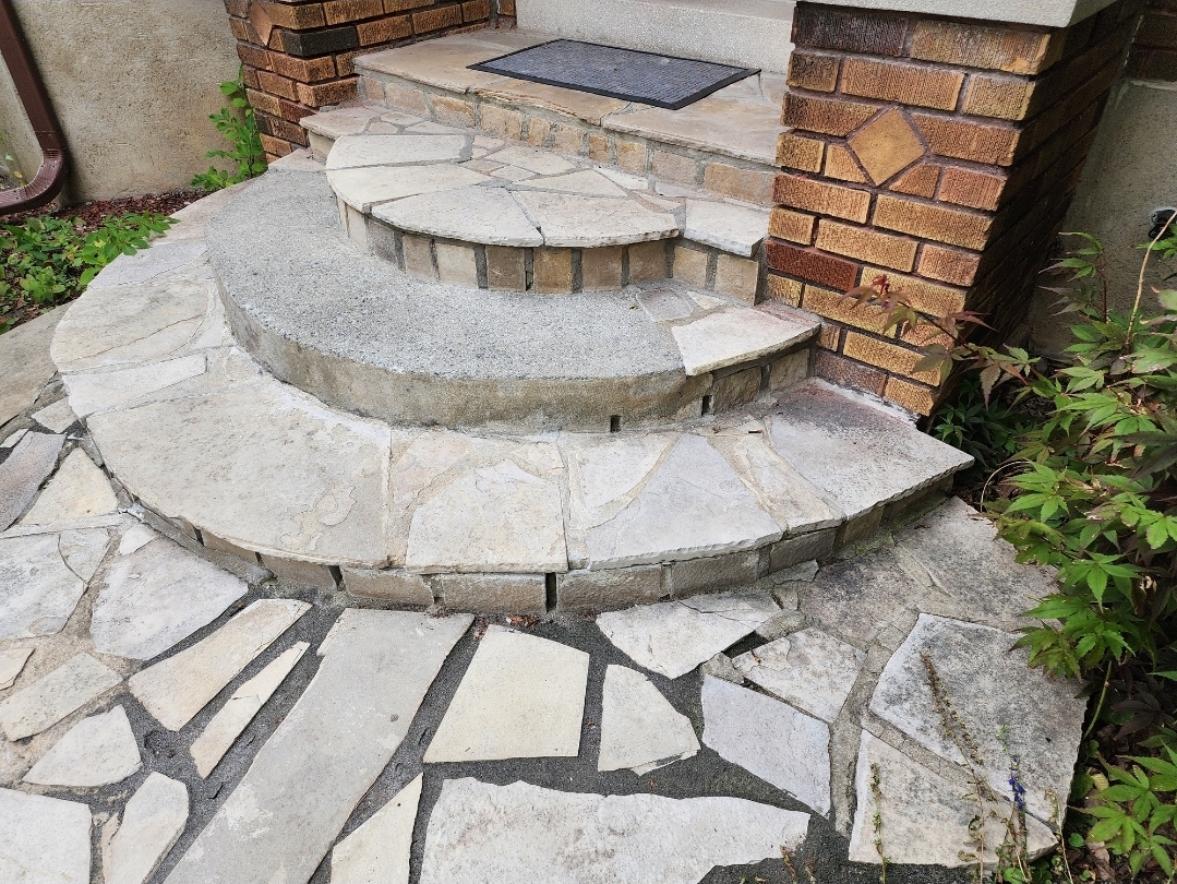 Existing stone front steps before reconstruction